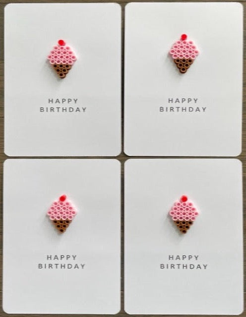 Picture of a set of 4 Happy Birthday cards with a pink ice cream cone on each