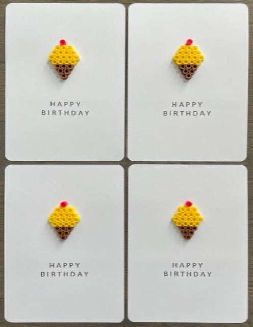 Picture of a set of 4 Happy Birthday cards that have a yellow ice cream cone on each one.