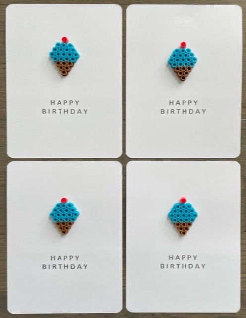 Picture of a set of 4 happy birthday cards that have a blue ice cream cone on each one