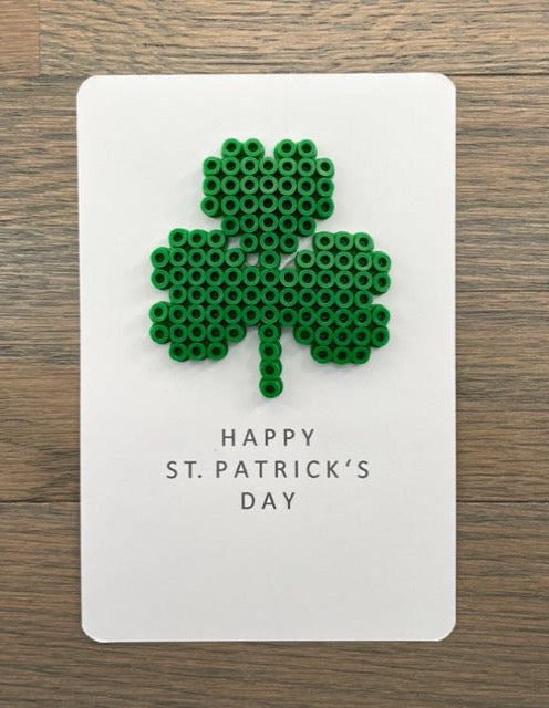 Picture of a Happy St. Patrick's Day card with a green 3 leaf clover on it