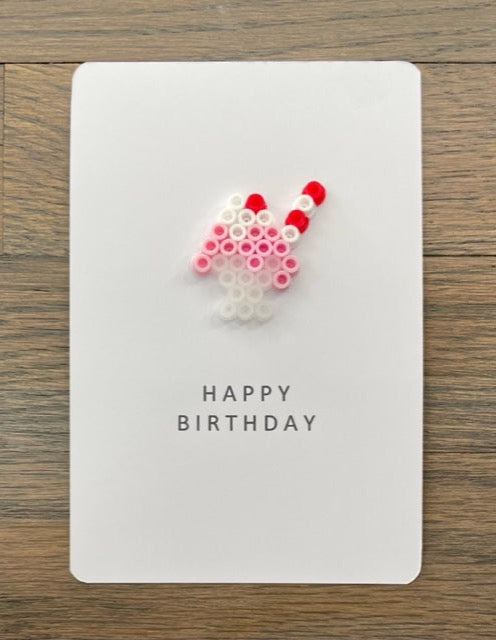 Picture of a Happy Birthday card with an old fashion pink ice cream soda on it