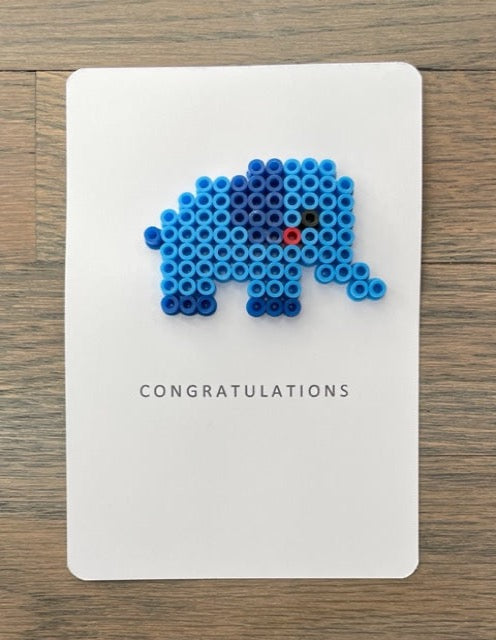 Picture of a Congratulations card with blue elephant on it