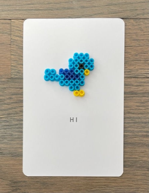 Picture of Hi card that has a blue bird on it