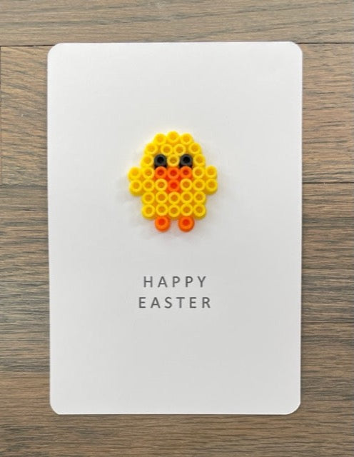 Picture of a Happy Easter card with a little yellow chick on it
