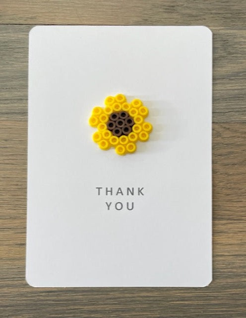 Picture of a Thank you card with a sunflower on it