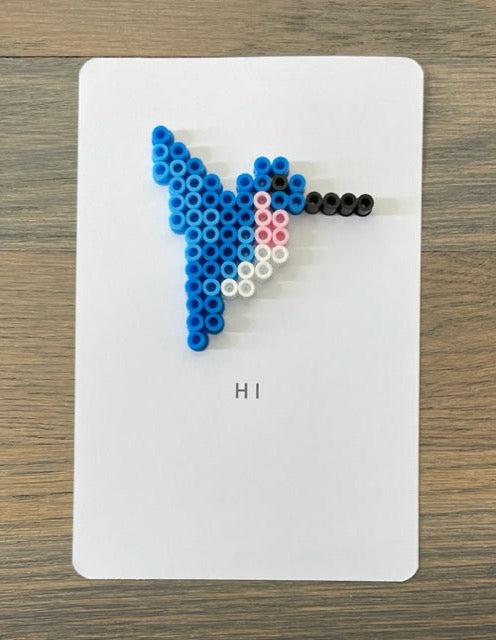 Picture of Hi card with a blue, white, pink hummingbird on it