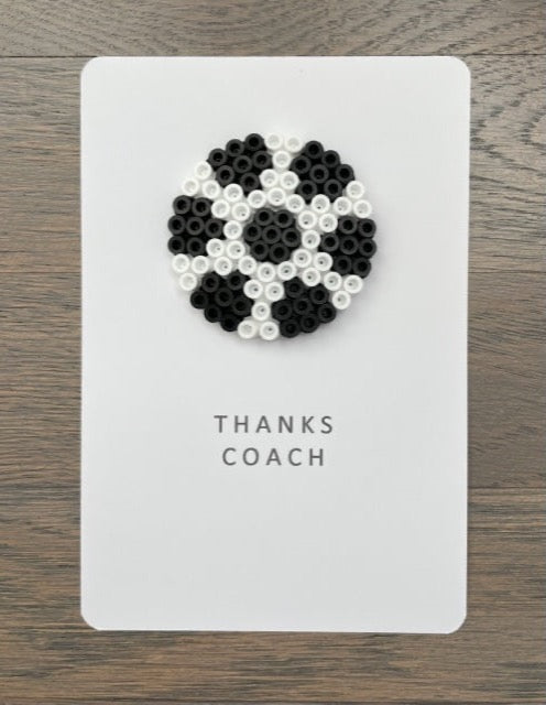 Picture of a Thanks Coach card with a soccer ball on it that can be used to thank a coach for a great season
