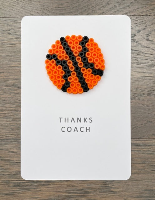 Picture of Thanks Coach card that has a basketball on it