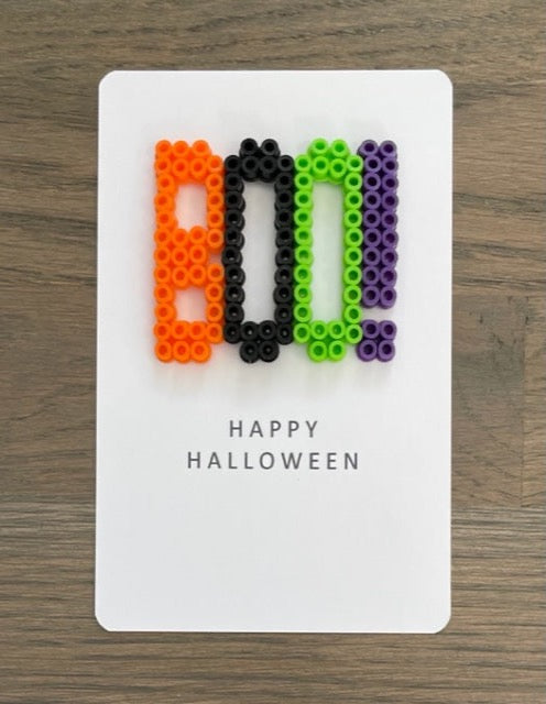 Picture of a Happy Halloween card that says Boo!