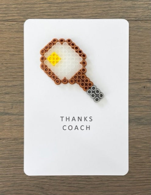 Picture of Thanks Coach card with a tennis racket and ball on it.